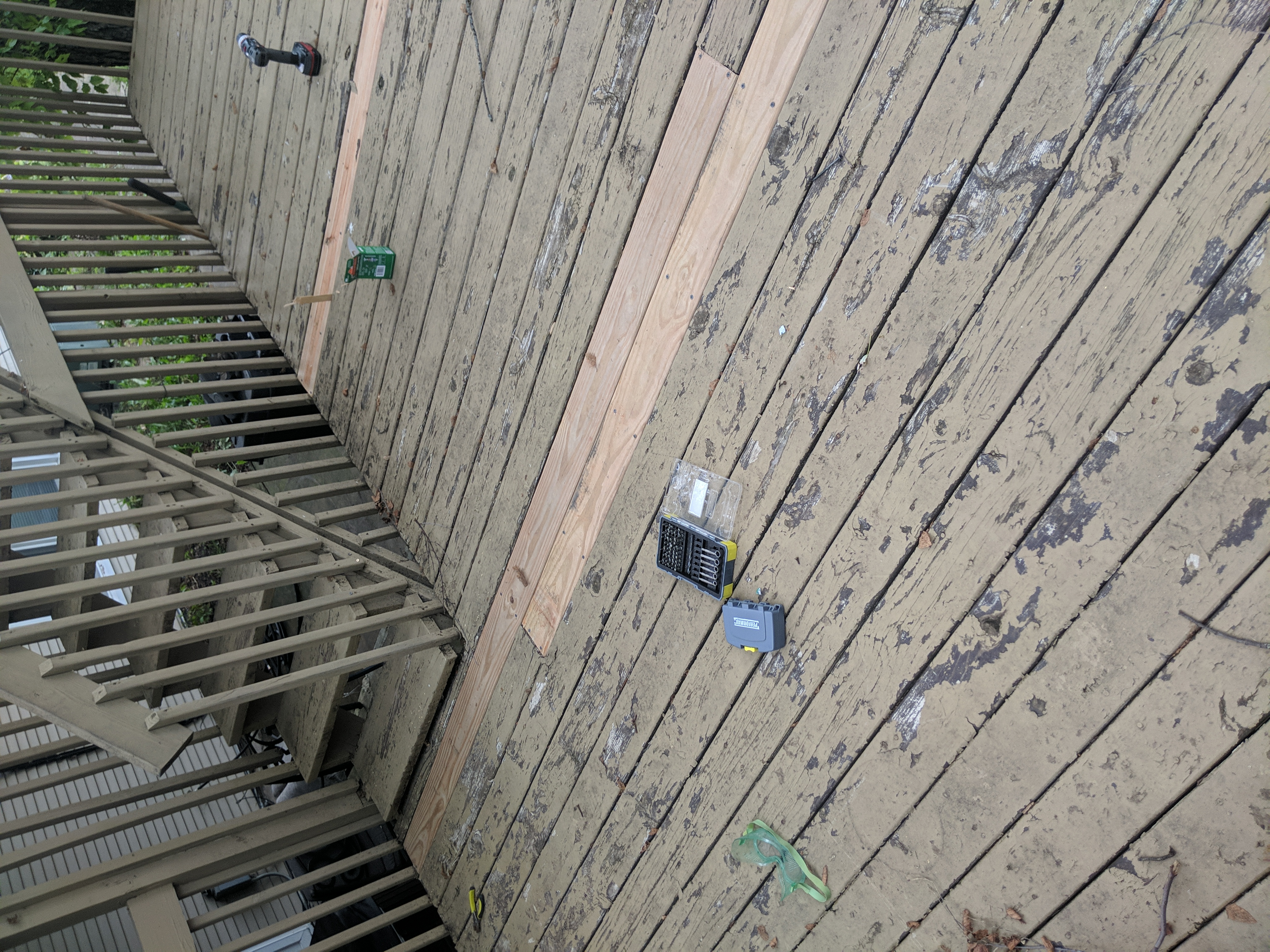 Deck board repair in progress